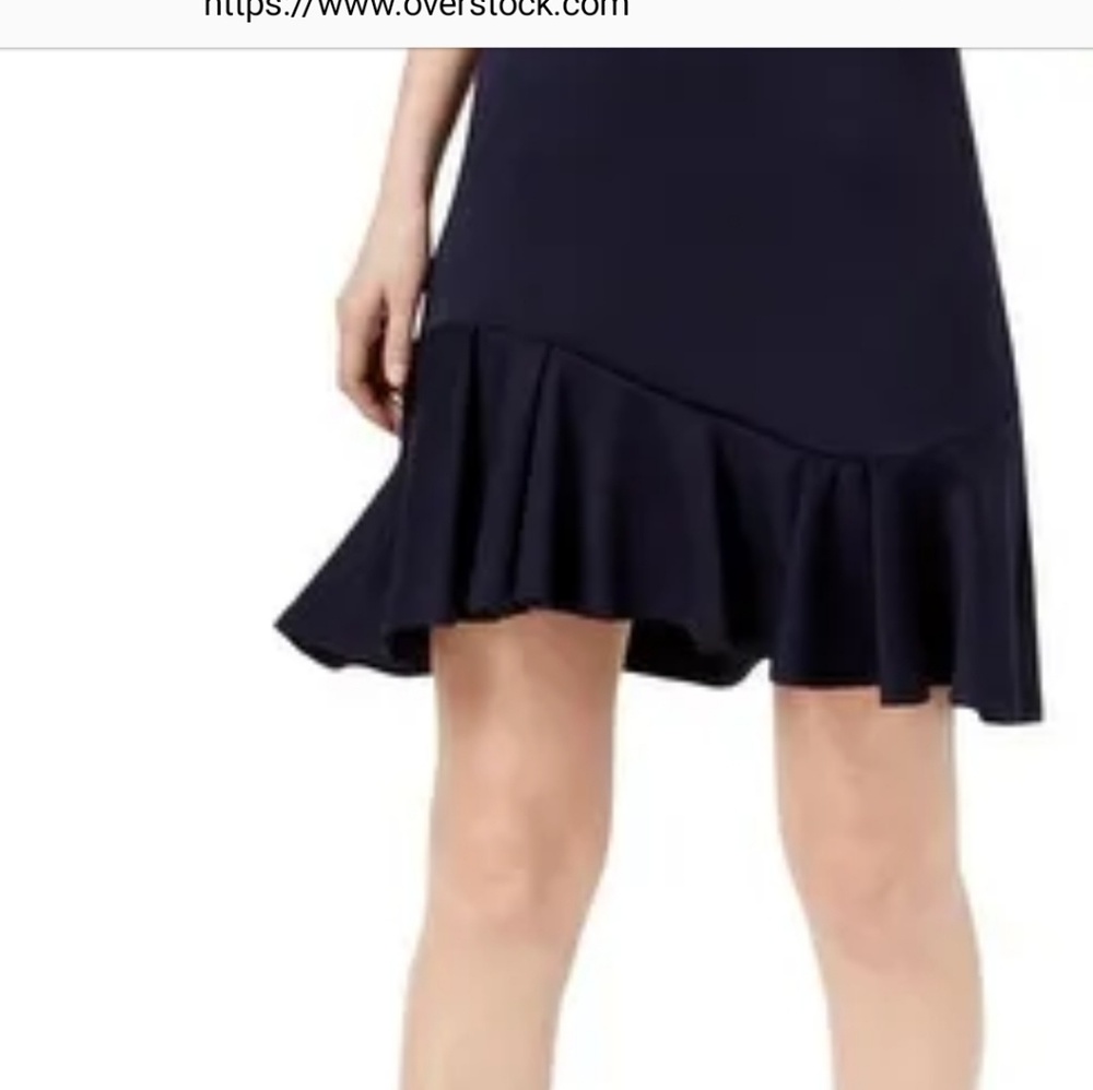 Ivanka Trump  black dress with lace brown designs